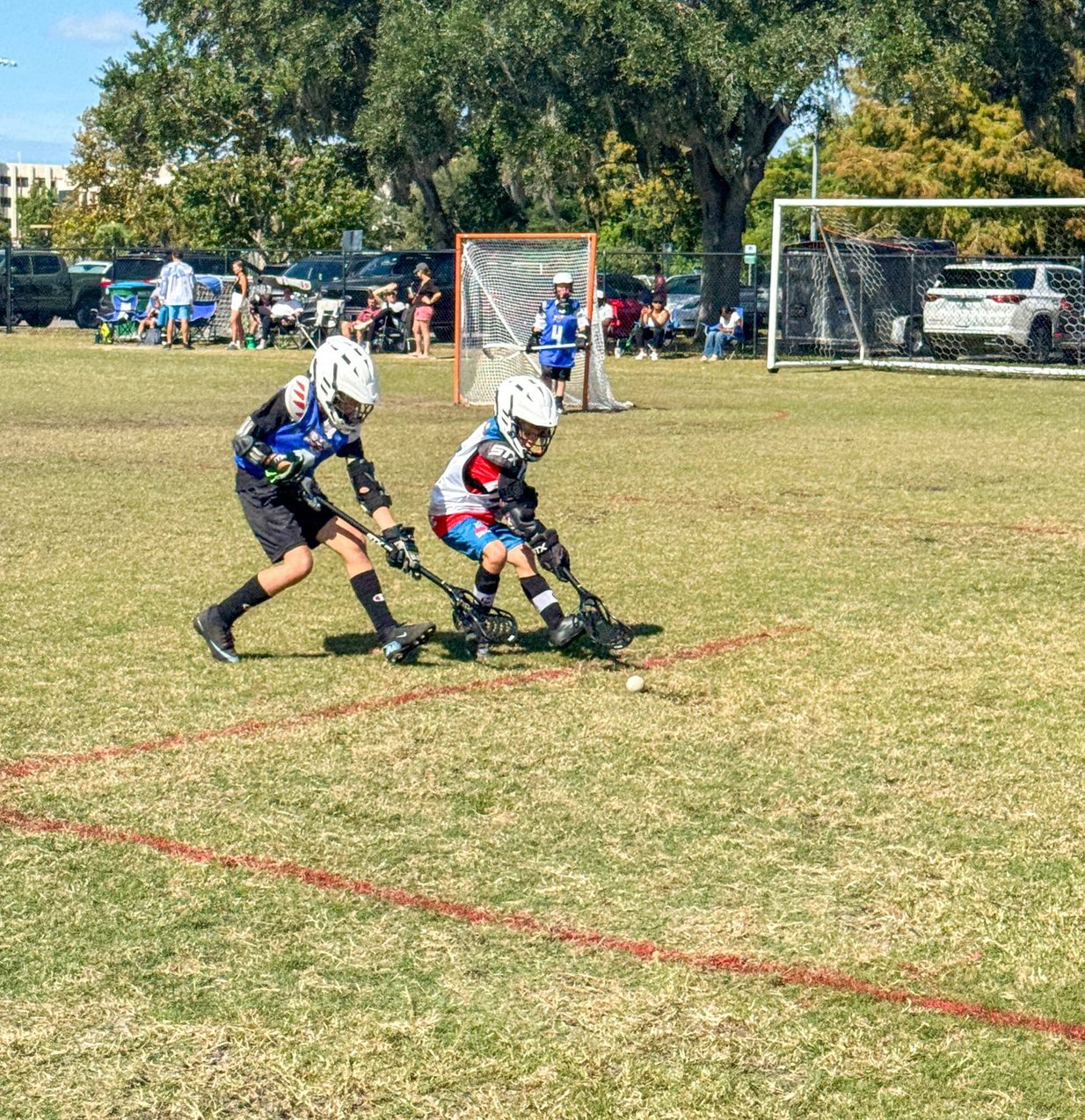 Player scooping ground ball during game
