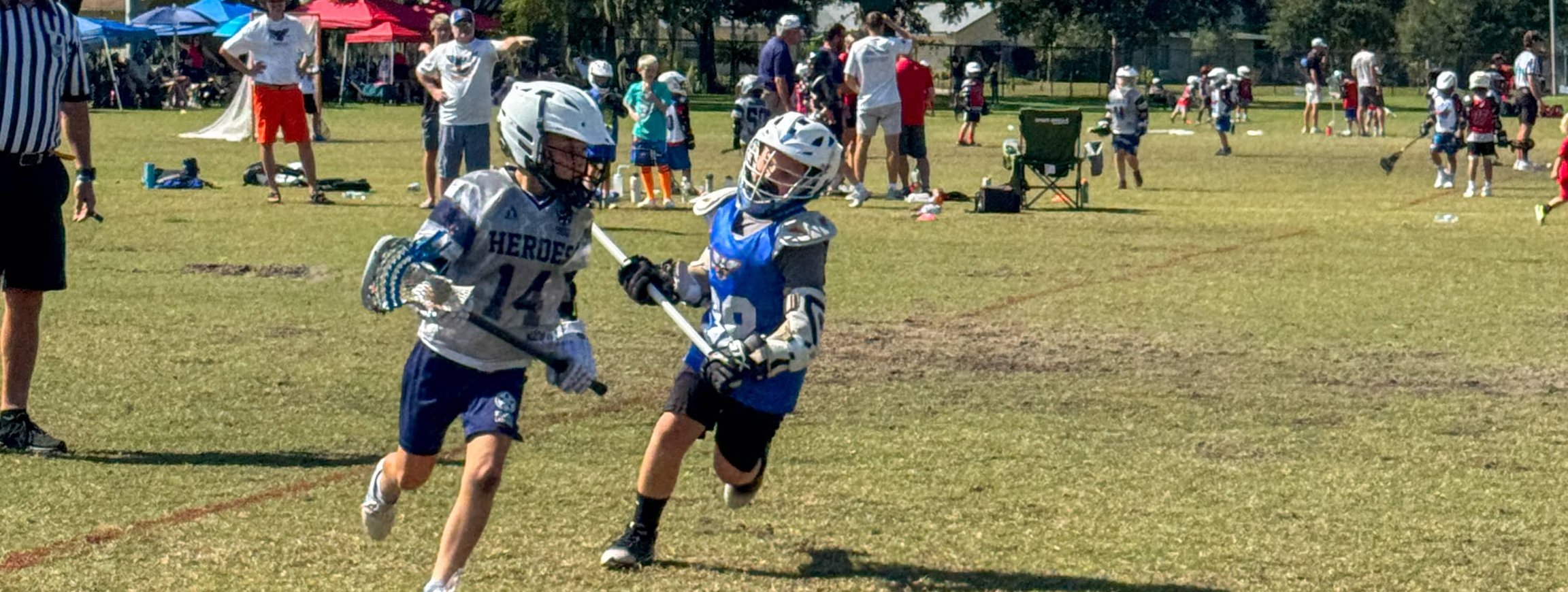 Youth game action at midfield