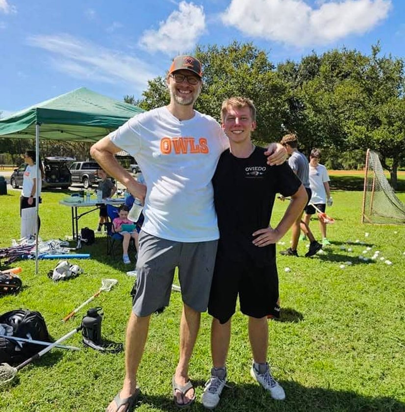 Youth lacrosse team warming up before game